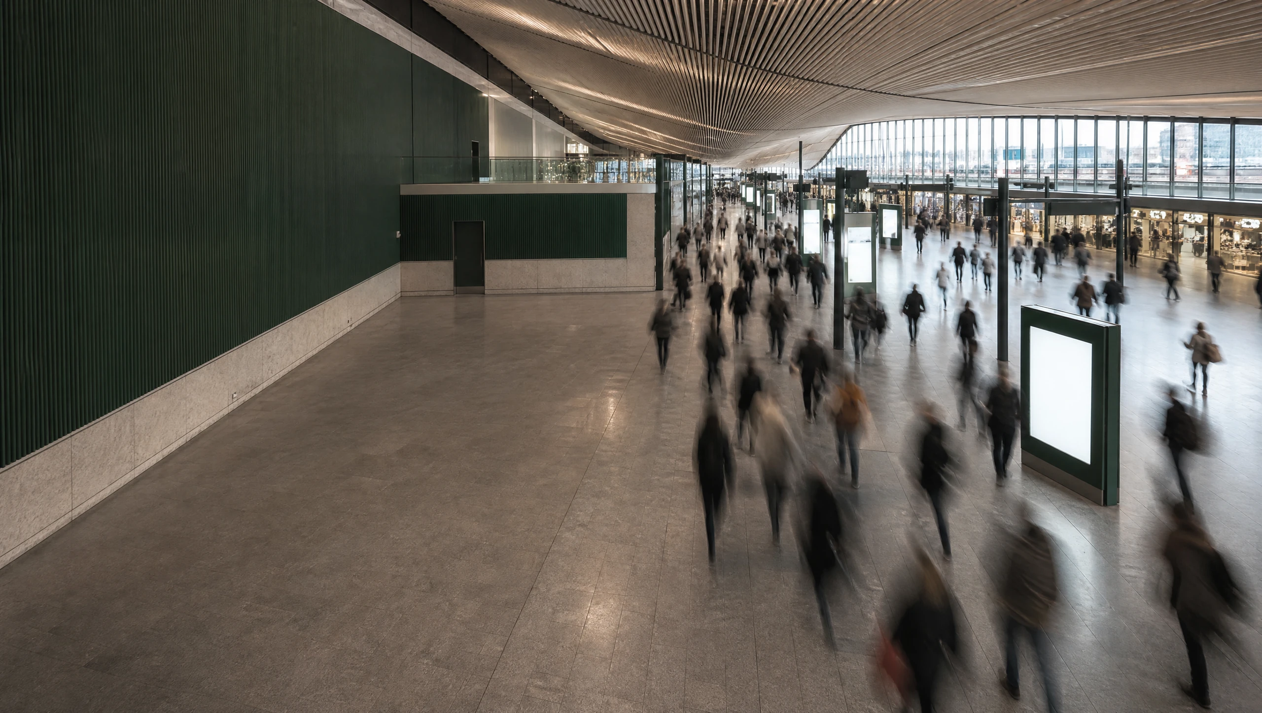 A transport interchange at rush hour, commuters as anonymous motion
